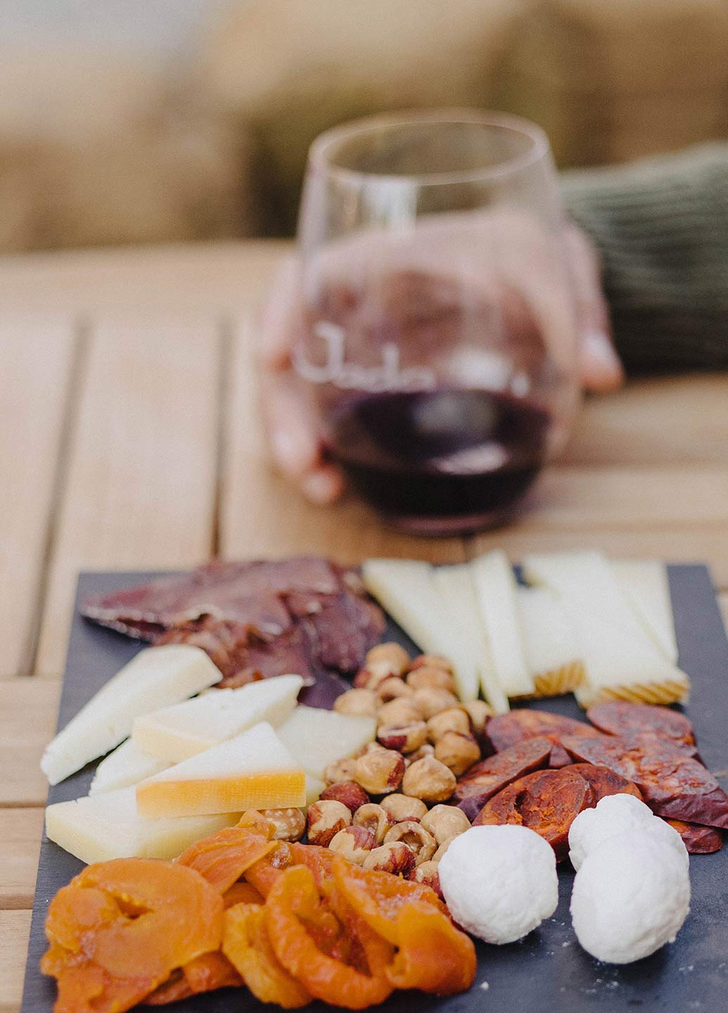 A wine tasting paired with a board of meats and cheese